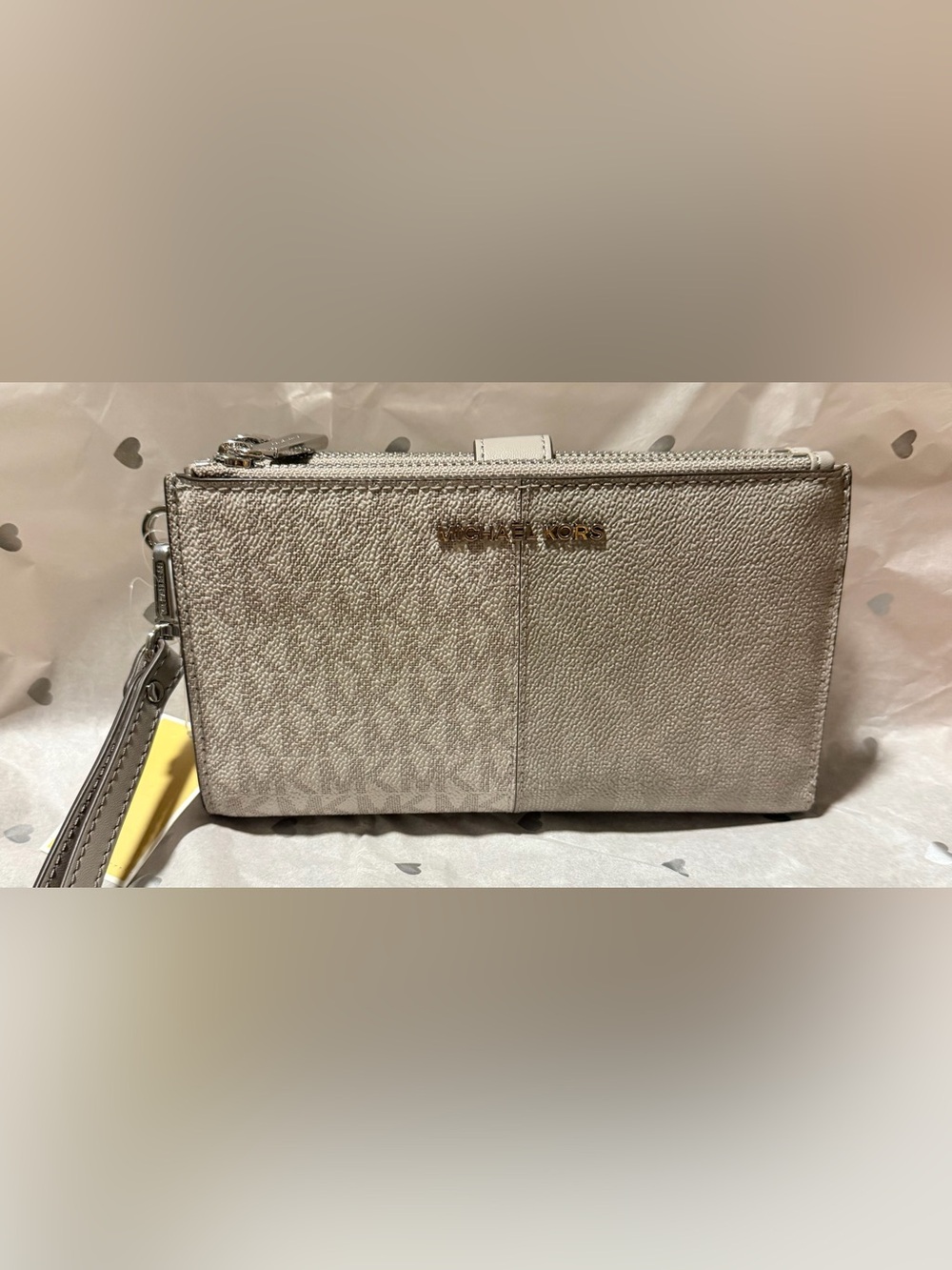 Michael Kors Metallic Silver Wristlet NWT W34